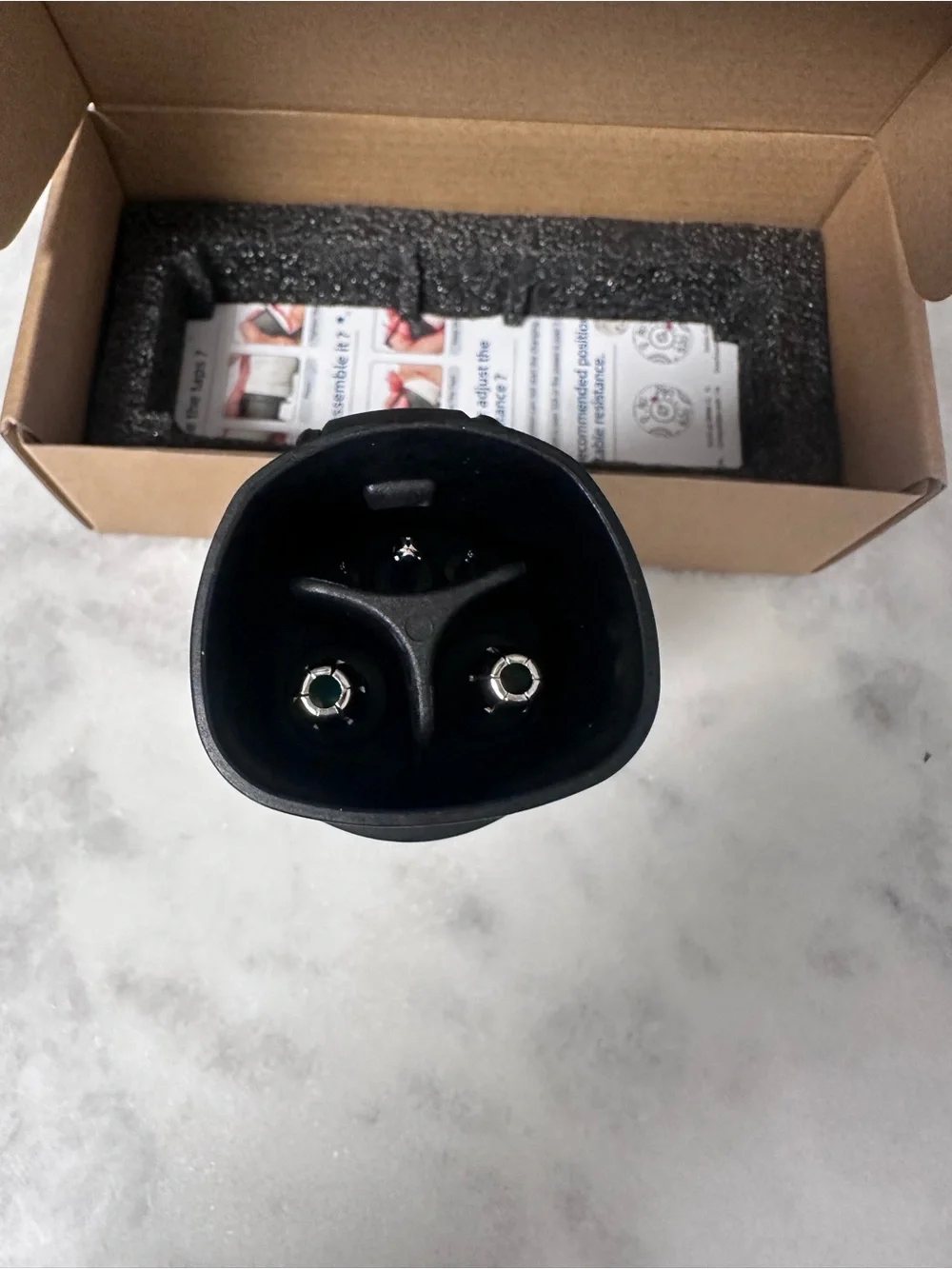 Source Unknown White and Black EV Charging Adapter Connector
